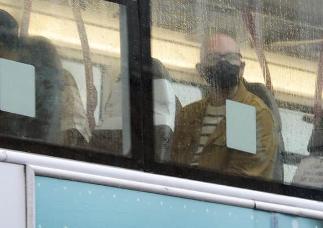 Public transport users in South Yorkshire wearing masks as they travel by bus. PIcture: Dean Atkins
