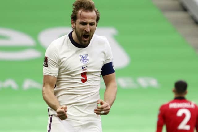England's Harry Kane celebrates his side's first goal during the World Cup 2022 group I qualifying soccer match between Albania and England at Air Albania stadium in Tirana. (AP Photo/Hektor Pustina)