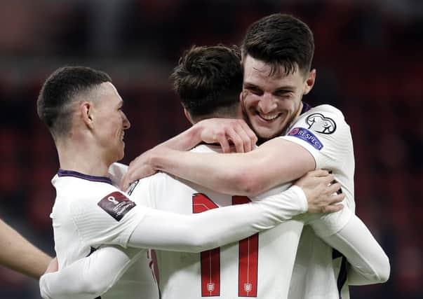 England's Mason Mount (centre) celebrates scoring their side's second goal of the game (Picture: Florian Abazaj/PA)