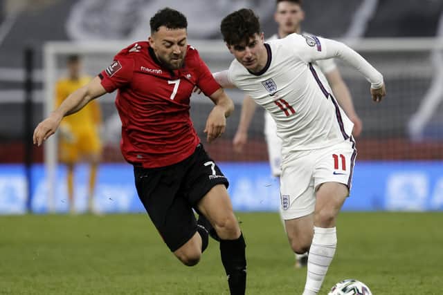 Albania's Keidi Bare (left) and England's Mason Mount battle for the ball (Picture: PA)