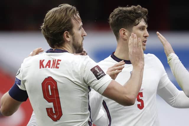 England's Harry Kane (left) was back among the goals (Picture: AP).