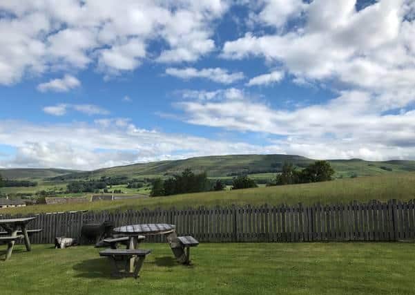 The Wensleydale Creamery garden with views across the Yorkshire Dales