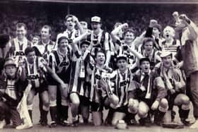 CUP UPSET: A jubilant Sheffield Wednesday team after beating Manchester United 1-0 at Wembley in the Rumbelows League Cup Final - April, 21 1991. Wednesday went on to win promotion at the end of the season 1990-91 season. Picture: Nancy Fielder/PA.