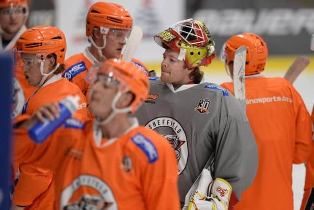 Steelers' players take a breather and a drink during Monday's practise session at Ice Sheffield. Picture courtesy of Dean Woolley.