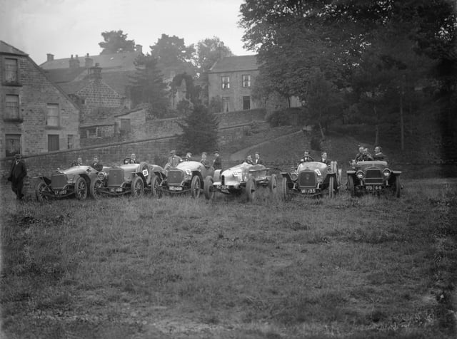 The Talbot team prepare for the Yorkshire Automobile Club hill climb at Pateley Bridge. Third from the right is Lambats' car.   (Photo by Topical Press Agency/Getty Images)