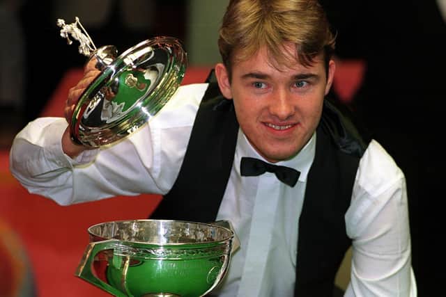 Champion: Stephen Hendry poses with the trophy. Picture: PA