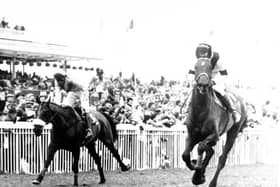 West Tip and Richard Dunwoody (right) deny Young Driver and Chris Grant (left) in the 1986 Grand National.
