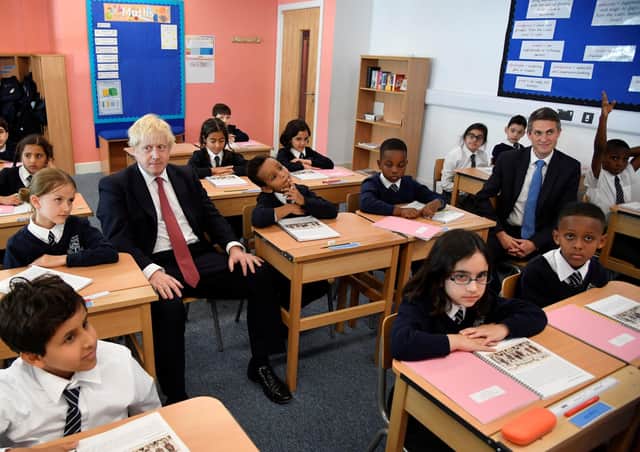 Boris Johnson and Gavin Williamson during a school visit prior to the lockdown.