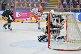 STRIKE ONE: Liam Kirk fires through Ben Bowns for his first of the night to make it 2-0 to Sheffield Steelers over Nottingham Panthers in the Elite Series. Picture courtesy of Dean Woolley.
