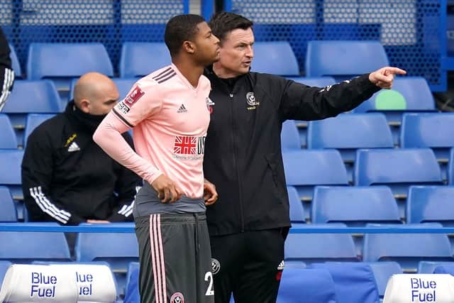 LEADING ROLE: Sheffield United's interim manager Paul Heckingbottom speaks with substitute Rhian Brewster at Stamford Bridge. Picture: John Walton/PA