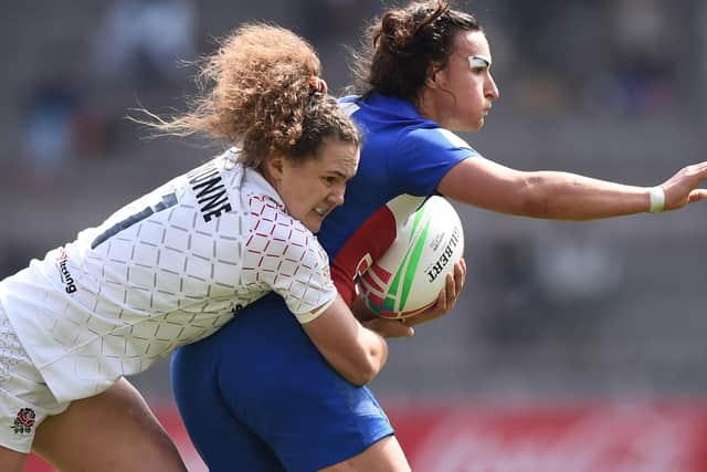 Shannon Izar of France is tackled by Ellie Kildunne of England during the Cup semi-final match between England and France on day two of the HSBC Women's Rugby Sevens Kitakyushu at Mikuni World Stadium on April 21, 2019, in Japan. (Picture: Matt Roberts/Getty Images)