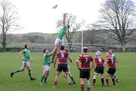 Out of action: The scene at Wharfedale’s Threshfields ground in happier times, main and right, when rugby union was being played and the ground was a thriving hub of spectators, players family and friends. (Picture: Tony Johnson)