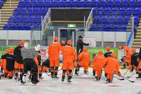 NOW HEAR THIS: Sheffield Steelers' head coach Aaron Fox goes through a drill with his players at Ice Sheffield earlier this week. Picture: Dean Woolley.