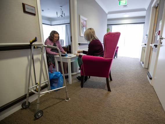 Care home residents will be allowed a second regular indoor visitor from April 12