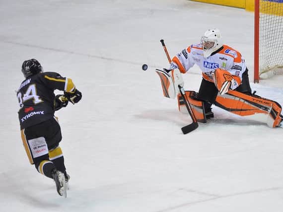 STOP RIGHT THERE: Ben Churchfield turns away Christophe Boivin's penalty shot in the 57th minute to preserve Sheffield Steelers' 3-2 lead over Nottingham. Picture courtesy of Dean Woolley.