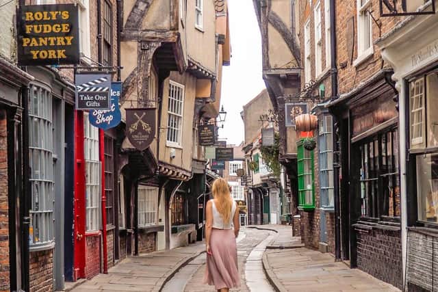 Cat Thomson, known as her alias 'Flying Scots Girl', pictured at The Shambles in York. Picture: Cat Thomson/Instagram