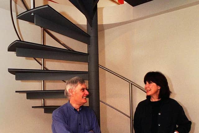 David Mellor and Fiona MacCarthy with the spiral staircase in the entrance of their home in Hathersage in the 1990s.