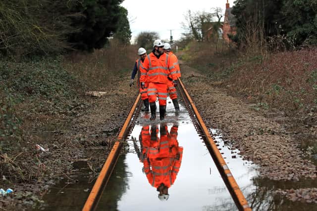 Network Rail engineers inspect a flooded line this week near Snaith.