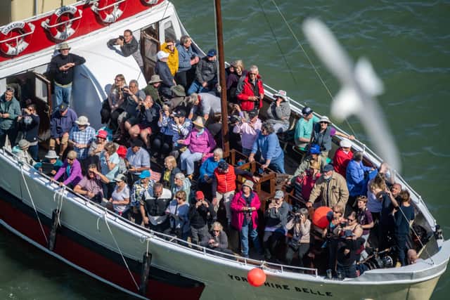 RSPB Bempton Cliffs, near Bridlington, which is home to around half a million seabirds between March and October all rasing a family on towering chalk cliffs overlooking the North Sea. Pictured is the famous Yorkshire Belle, packed with tourist visiting the cliff face in May 2019. Picture: James Hardisty