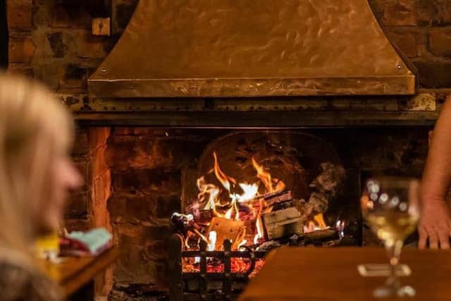 Log fires will be phased out under government plans to reduce harmful emissions.