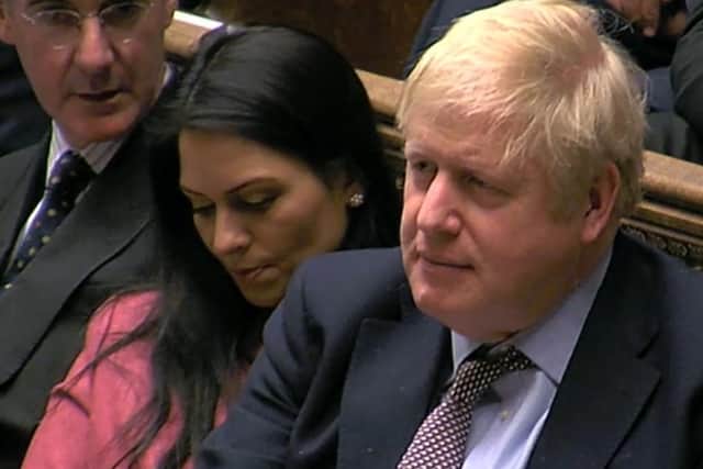 Boris Johnson defended Priti Patel at PMQs.