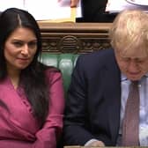 Priti Patel and Boris Johnson during PMQs.