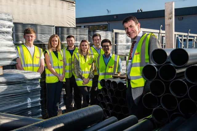 CEO Edward Naylor (right) and and group HR manager Corina Cato (second left) with Naylor Industries trainees at the company's Wombwell factory.