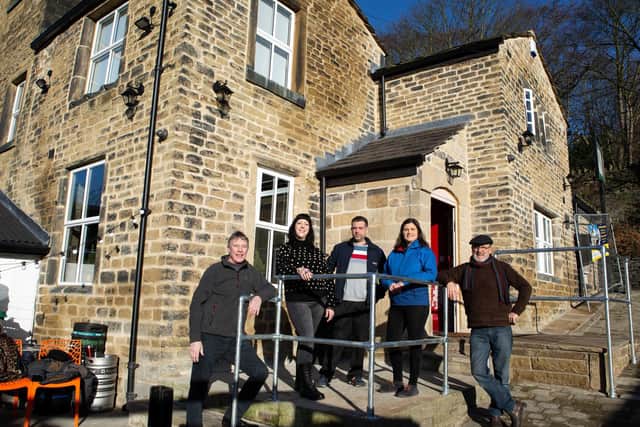 Committee members Paul Mansley, Jenny Bromley, Sam Irvine, Netty Berry and Bruce Fitzgerald outside the refurbished Puzzle Hall Inn in Sowerby Bridge.