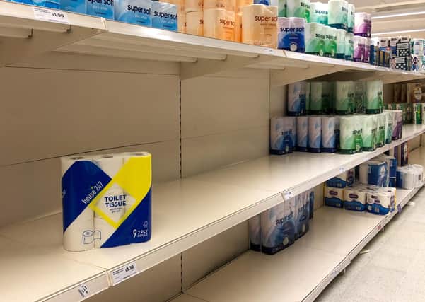 A shortage of toilet rolls on the shelves at a Sainsbury's supermarket in Cambridge, as Prime Minister Boris Johnson announces the government's coronavirus action plan.