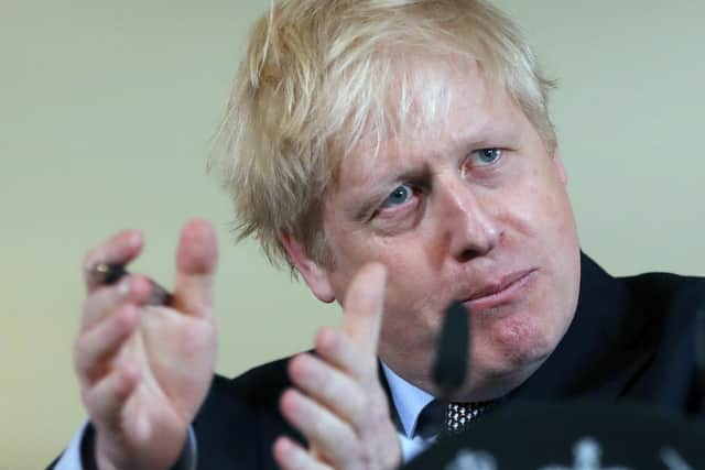 Prime Minister Boris Johnson speaks during a press conference, at 10 Downing Street, in London, on the government's coronavirus action plan.