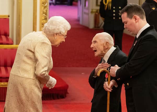 The Queen presented D-Day veteran Harry Billinge with a MBE for charity fundraising.