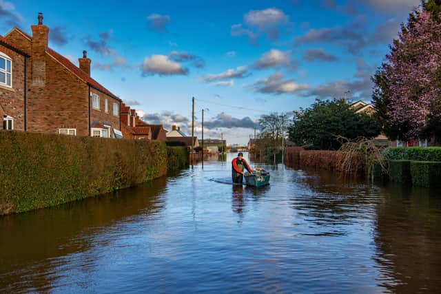 This was the flooding in East Cowick as Brigg and Goole MP Andrew Percy calls for more help from the Government. Photo: James Hardisty.