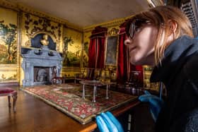 Sophie Bryan, collections assistant, with the restored 18th-century dolls' house at Nostell, near Wakefield. Picture: James Hardisty