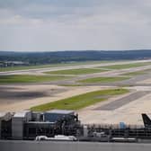 Library image of Gatwick Airport. Wizz Air said it has bought 15 daily slots from Norwegian Air Shuttle at Gatwick, leading to four extra planes being based at the London airport.