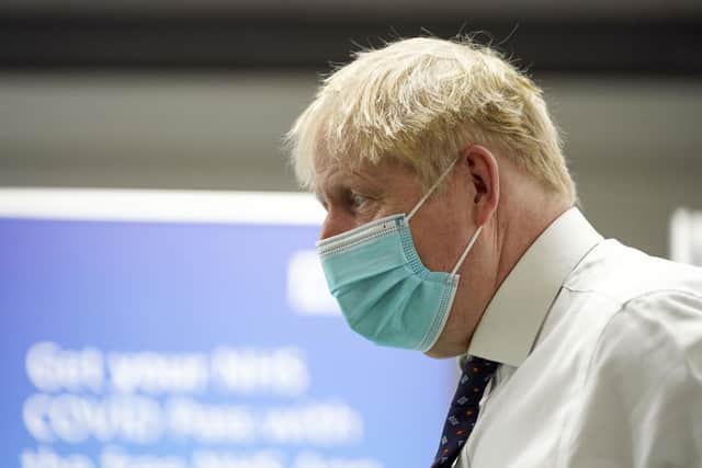 Prime Minister Boris Johnson during a visit to a vaccination hub in the Guttman Centre at Stoke Mandeville Stadium in Aylesbury, Buckinghamshire on January 3