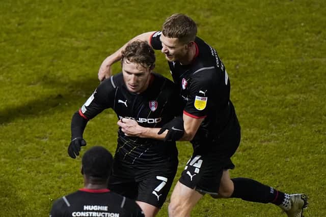 Rotherham United's Kieran Sadlier (centre) celebrates scoring their side's first goal. Picture: PA