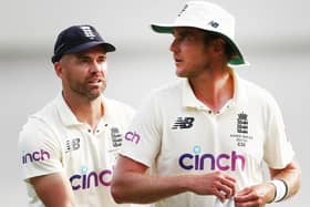 Irreplaceable: England's Stuart Broad, right, is congratulated by James Anderson during day two of the fourth Ashes test at Sydney. Picture: Jason O'Brien/PA Wire.