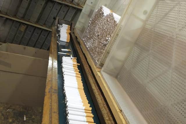 The conveyor belt of illegal cigarettes