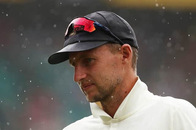 England's Joe Root walks off as rain stops play during day one of the fourth Ashes test at the Sydney Cricket Ground, Sydney. (Picture: Jason O'Brien/PA Wire)