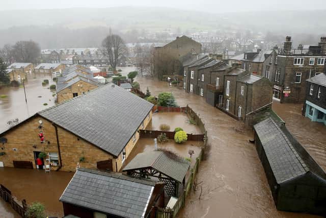 Devastating flooding hit the town of Mytholmroyd on December 26, 2015 - causing damage to local schools that took almost a year to fix (Photo by Christopher Furlong/Getty Images)