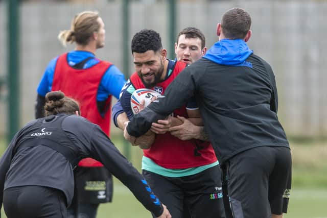 LIMBERING UP: Wakefield Trinity players in training yesterday. 
Picture: Tony Johnson.