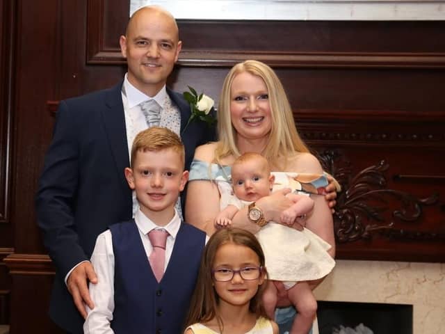 Kate Watkinson, pictured with her family, will have two operations to deal with her adolescent idiopathic scoliosis and kyphosis.