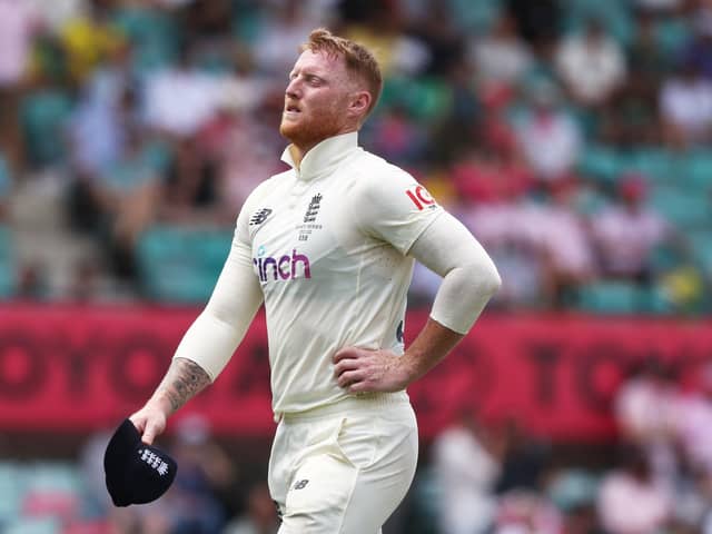Injured: England's Ben Stokes leaving the field with a side injury.
