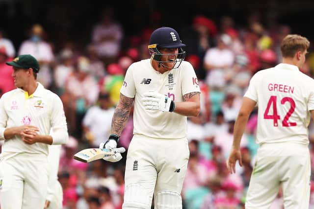 Not out: England's Ben Stokes reacts to the ball failing to dislodge the bails after striking the stump.
