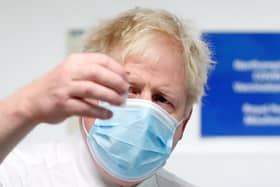 Prime Minister Boris Johnson during a visit to a vaccination centre earlier this week (PA)