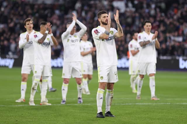 Mateusz Klich of Leeds United applauds the fans following defeat in the Emirates FA Cup Third Round match at West Ham. (Photo by Alex Pantling/Getty Images)
