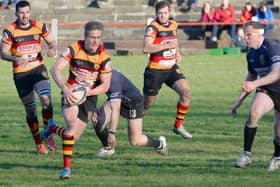 Leveller: Lewis Minikin (with ball) landed a late conversion to earn Hull Ionians a draw at Tynedale. (Photo: Richard Bown)
