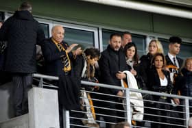 Assem Allam's, pictured left with his son Ehab to his left, ownership of Hull City appears to be coming to an end. Picture: Tony Johnson
