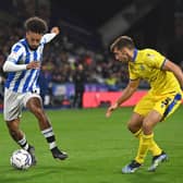 WIDE BOY: 
Huddersfield Town's Sorba Thomas makes a move past Blackburn Rovers' Harry Pickering earlier this season. Picture: Bruce Rollinson