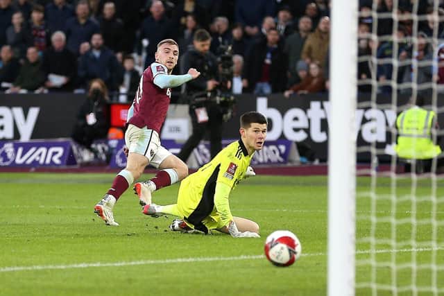 CLINCHER: West Ham United's Jarrod Bowen (left) scores his side's second goal against Leeds United at London Stadium. Picture: Nigel French/PA